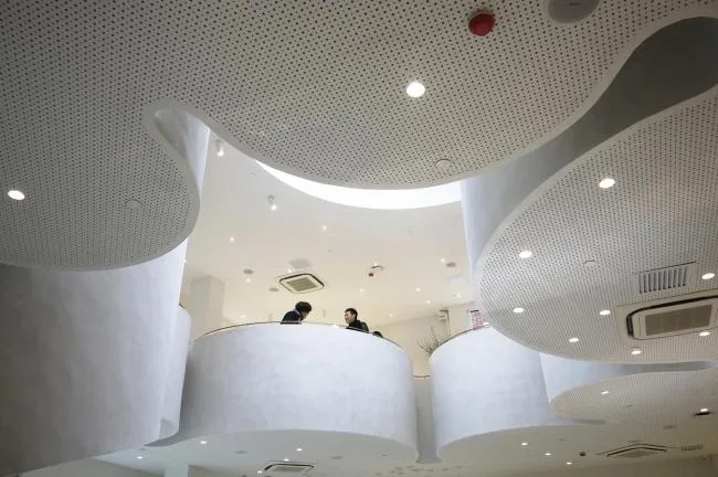 BIM建筑|旋曲空间谱写出活动的音乐——上海鹰集咖啡丰富里店 / 不迫建筑工作室
