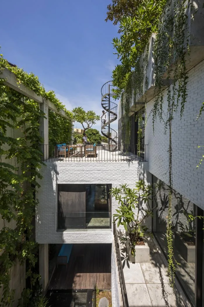 BIM建筑|错落的盒子，可呼吸的“绿色之肺”：岘港住宅 / 武重义建筑事务所