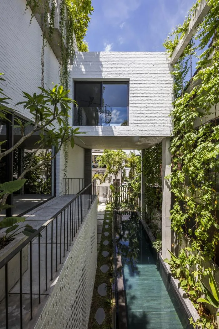 BIM建筑|错落的盒子，可呼吸的“绿色之肺”：岘港住宅 / 武重义建筑事务所